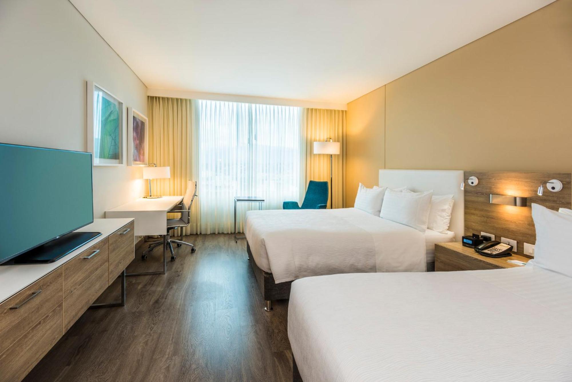 Holiday Inn Cucuta By Ihg Ngoại thất bức ảnh A typical room at the hotel